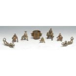 A collection of Indian bronze and base metal domestic shrine murti, cast as the infant Krishna, etc;