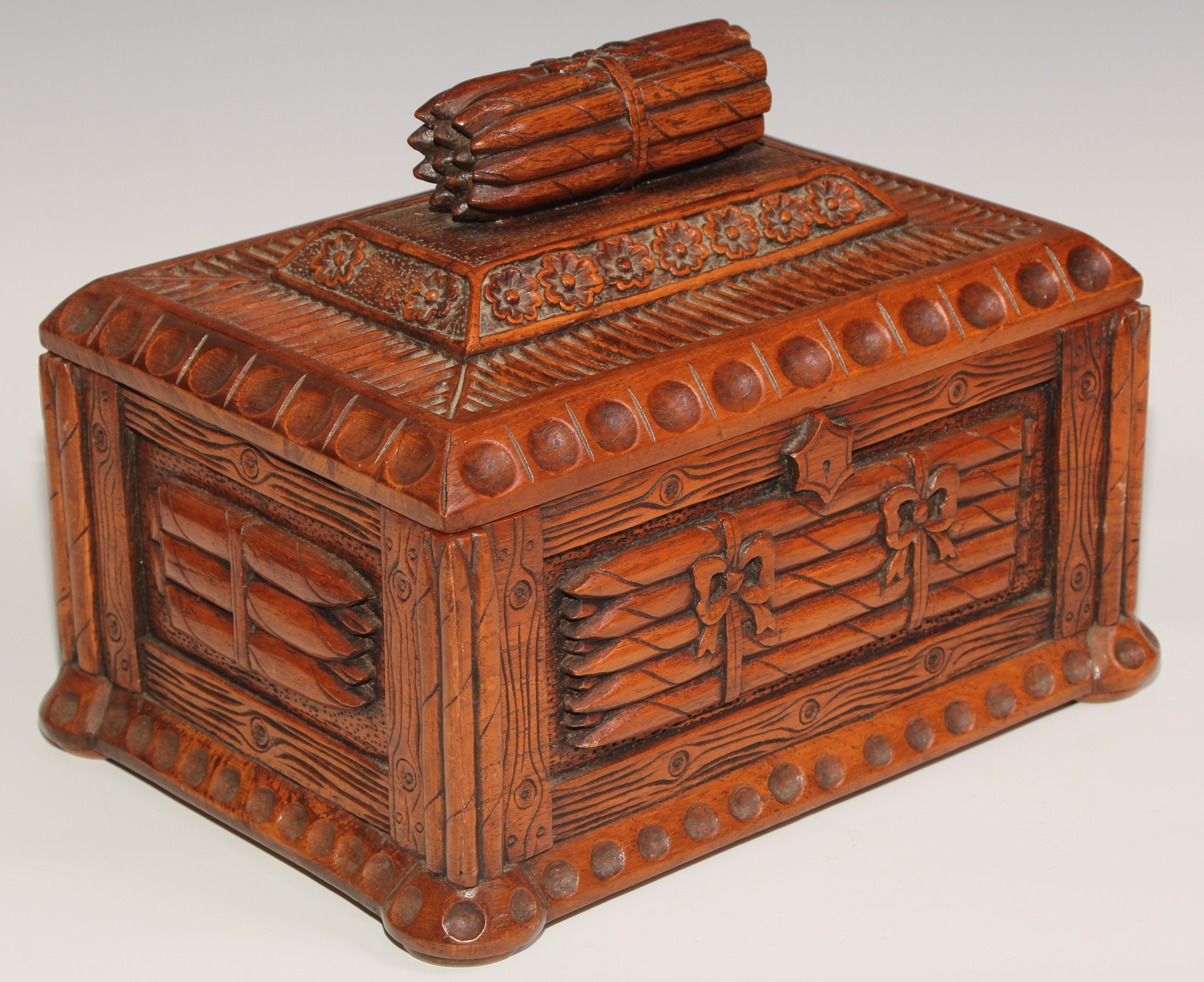 An unusual hardwood rectangular cigar box, carved and surmounted with bundles of cigars, 30cm - Image 2 of 5