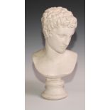 A composition bust, in manner of Michelangelo's David, circular pedestal base, 38.5cm high