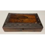 A 19th century rosewood and cut-steel pique rectangular box, hinged cover with a broad border of