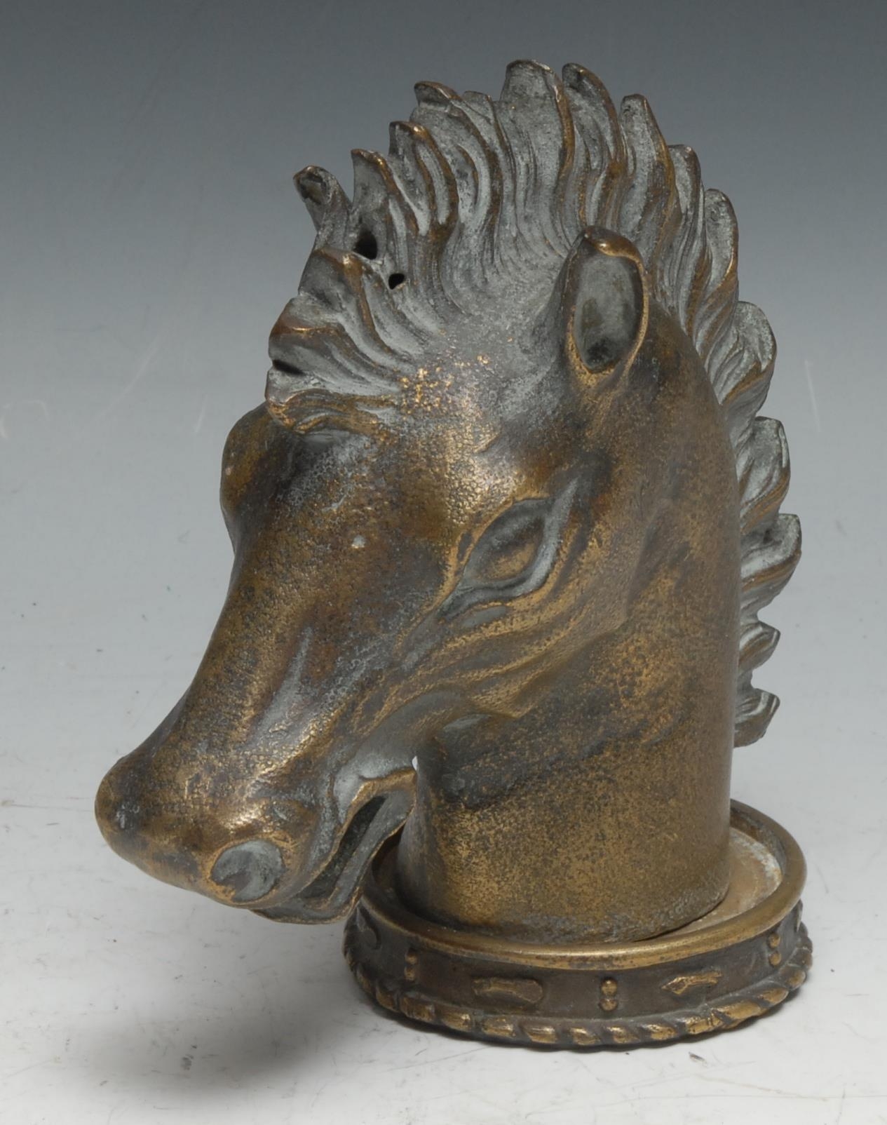 Automobilia- an early 20th century brass car mascot, cast as a horse's head, 14cm high