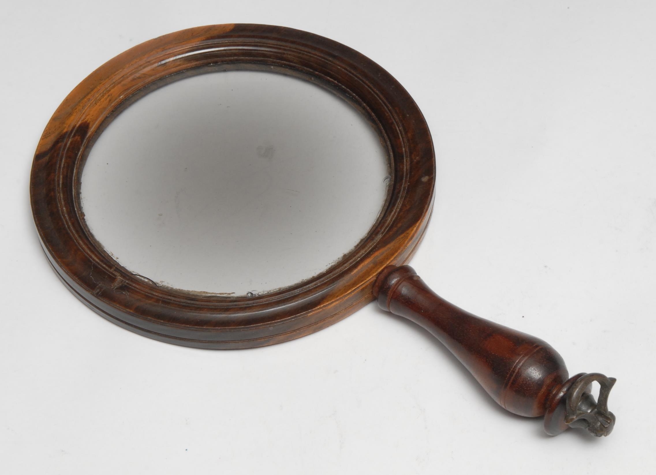 A 19th century lignum vitae connoisseur's lens, circular magnifying glass, turned handle with