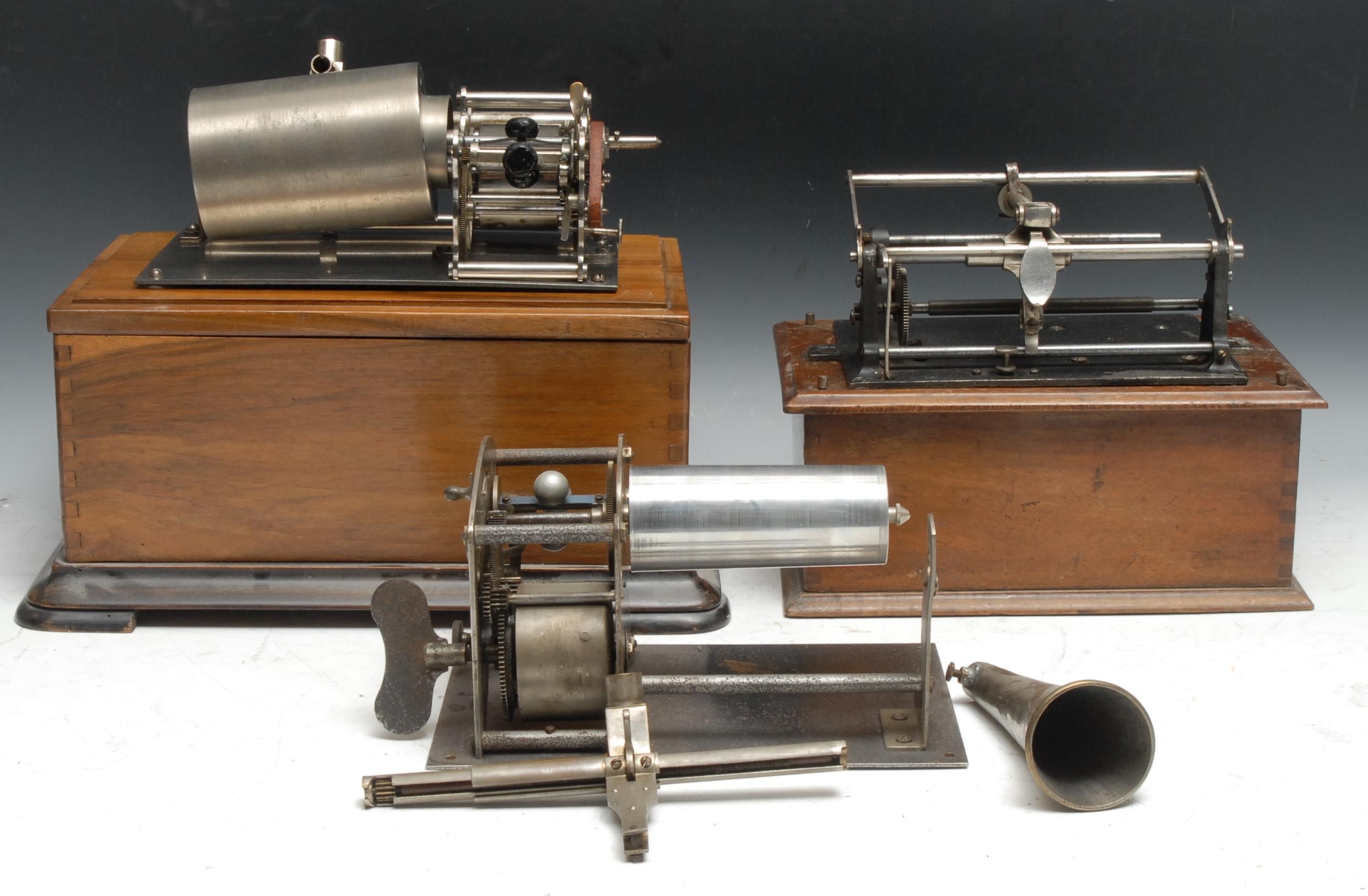 An early 20th century cylinder phonograph, walnut case; another Pathe Feres, part; etc (3)