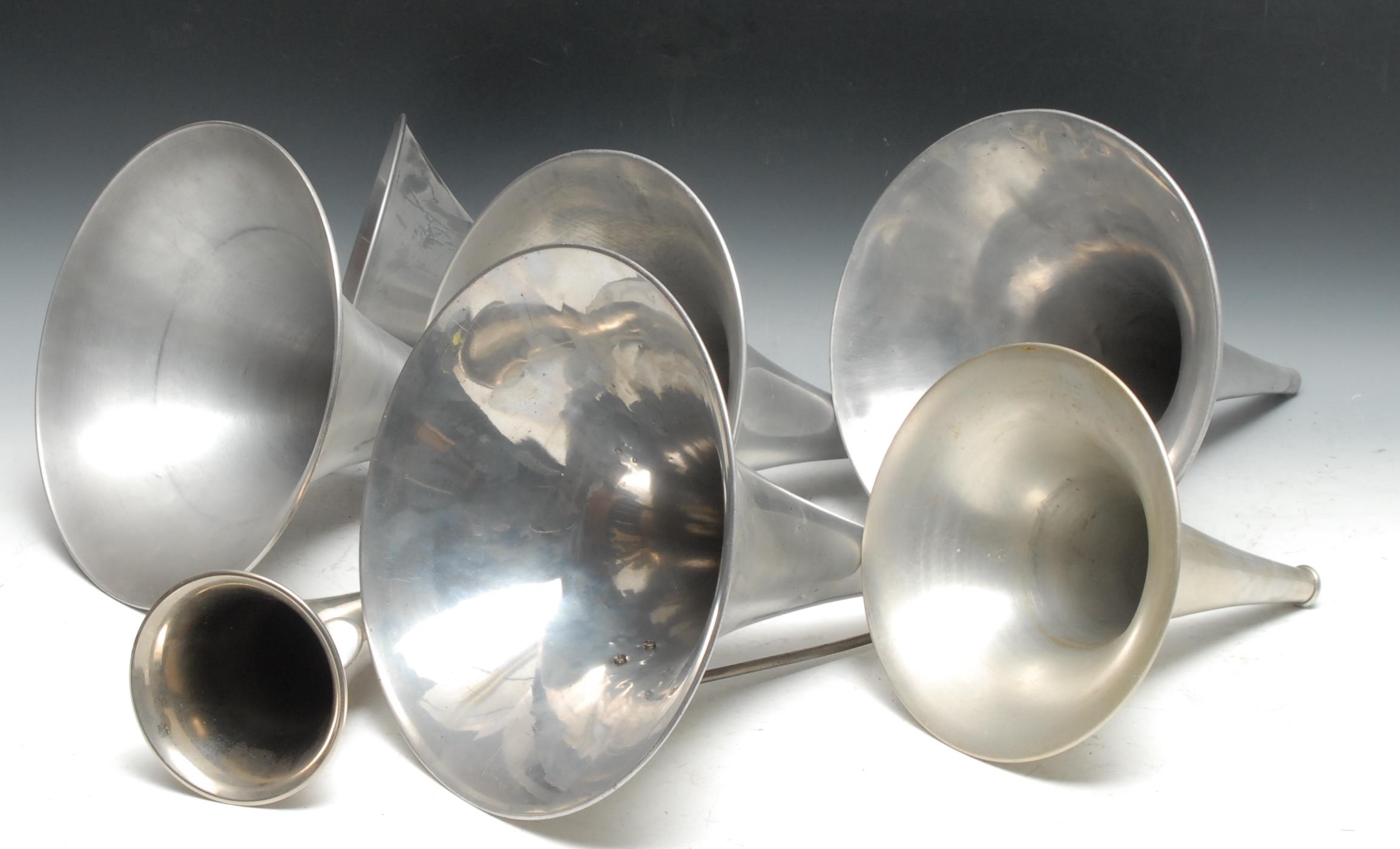 An early 20th century aluminium phonograph horn, 33cm high; others, various