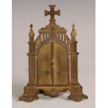 A 19th century brass domestic cabinet altarpiece, the Gothic Revival easel triptych frame