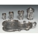 A French silvered metal smoking room service on tray, comprising tabacco jar, spill vase and vesta