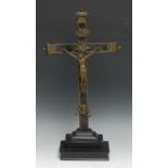 An 18th century North European bronze and ebony Corpus Christi, stepped base, 46cm high, c.1775