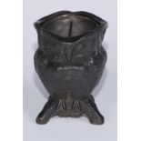 A Chinese pewter novelty smoking companion, as an owl, revolving ashtray, 10cm high, character