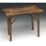 A campaign type folding stool, 40cm wide, c.1900