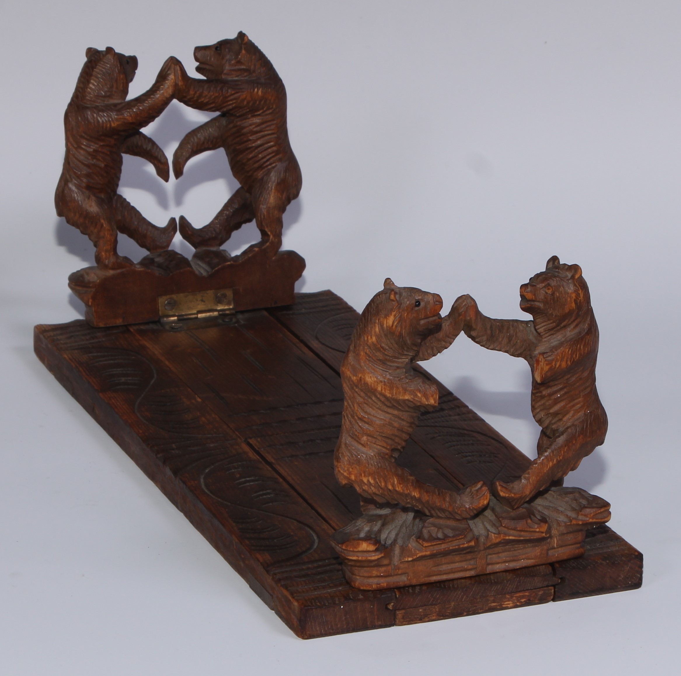 A Black Forest novelty book slide, each folding end support carved with dancing bears, 31cm wide, - Image 3 of 5