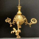 Interior Decoration and Lighting - a Dutch gilt metal three-branch gasolier, in the Baroque taste,