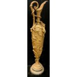 A large Renaissance Revival gilt metal slender ovoid ewer, cast with roses, salamander and squirrel,