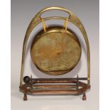 A Victorian brass and copper novelty table top dinner gong, of equestrian interest, as an oversize