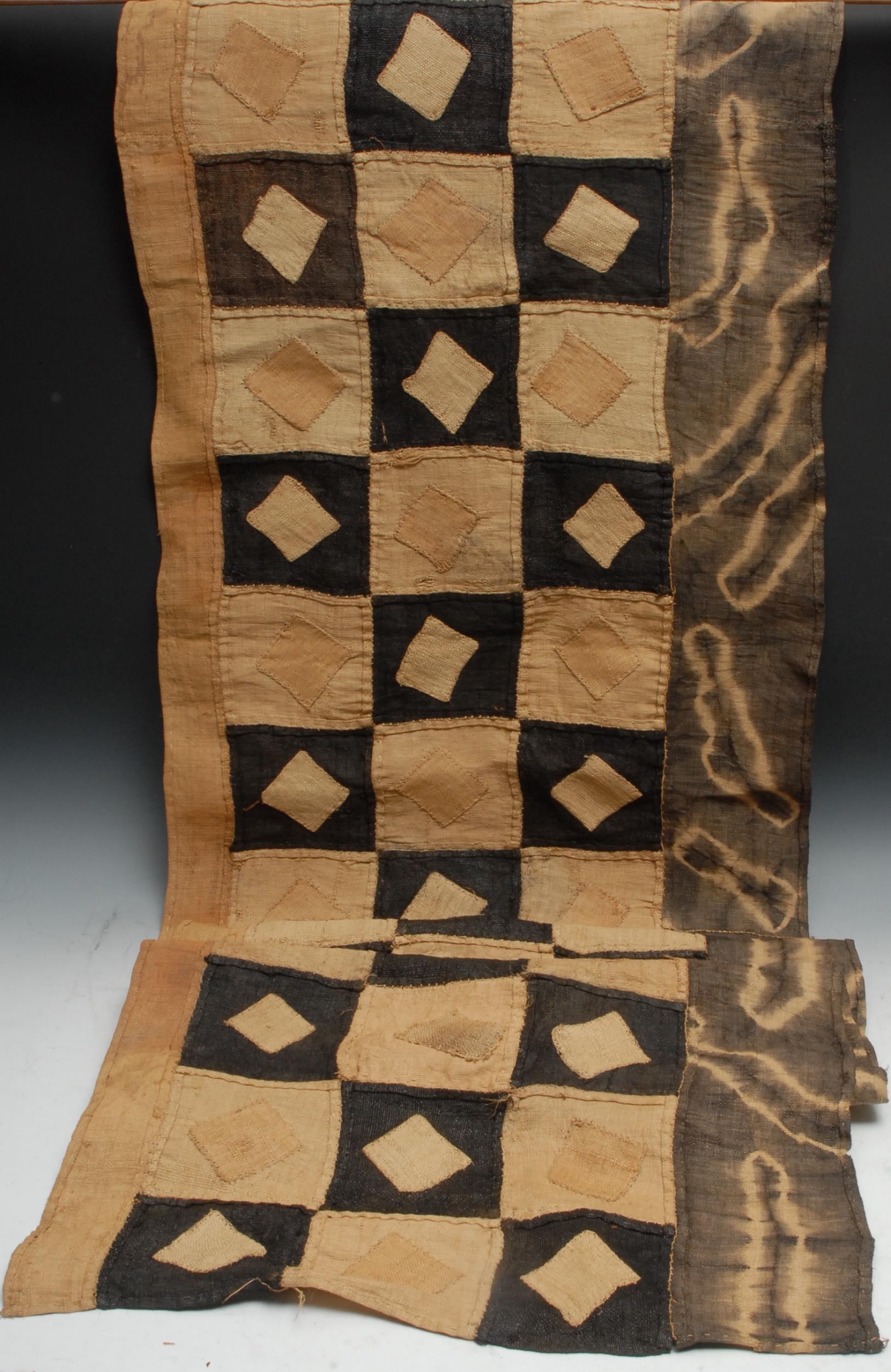 A Kuba Congolese woven panel, alternating black and cream geometric panels, approx 324cm long, - Image 2 of 2