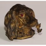 A 19th century gilt metal novelty inkwell, cast as the head of a spaniel dog, hinged cover, the