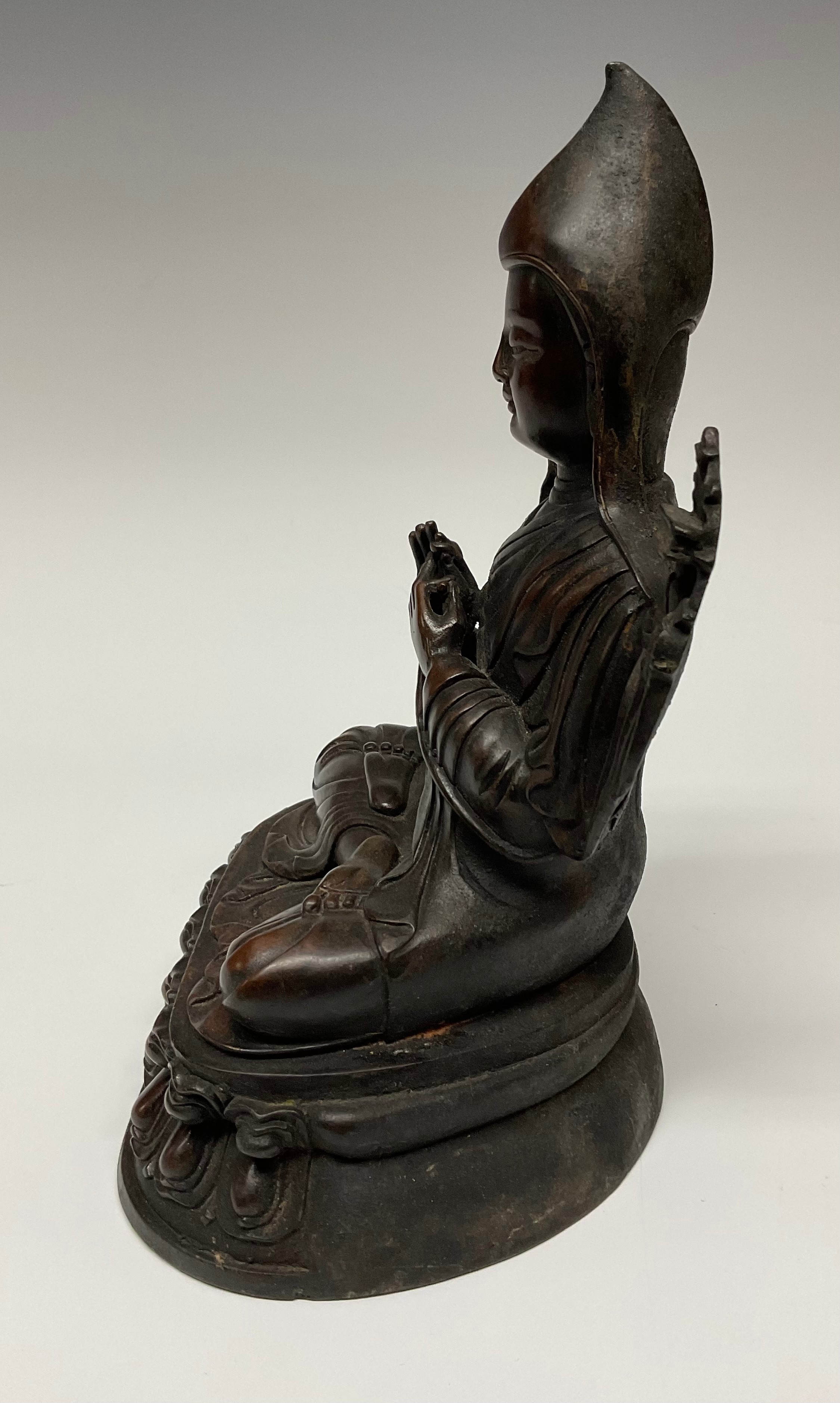 Tibetan School, a bronze, Tsongkhapa, seated in meditation, lotus base, 23.5cm high - Image 3 of 4