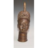 Decorative Tribal Art and the Eclectic Interior- a bronze, cast as the head of an Oba or figure of