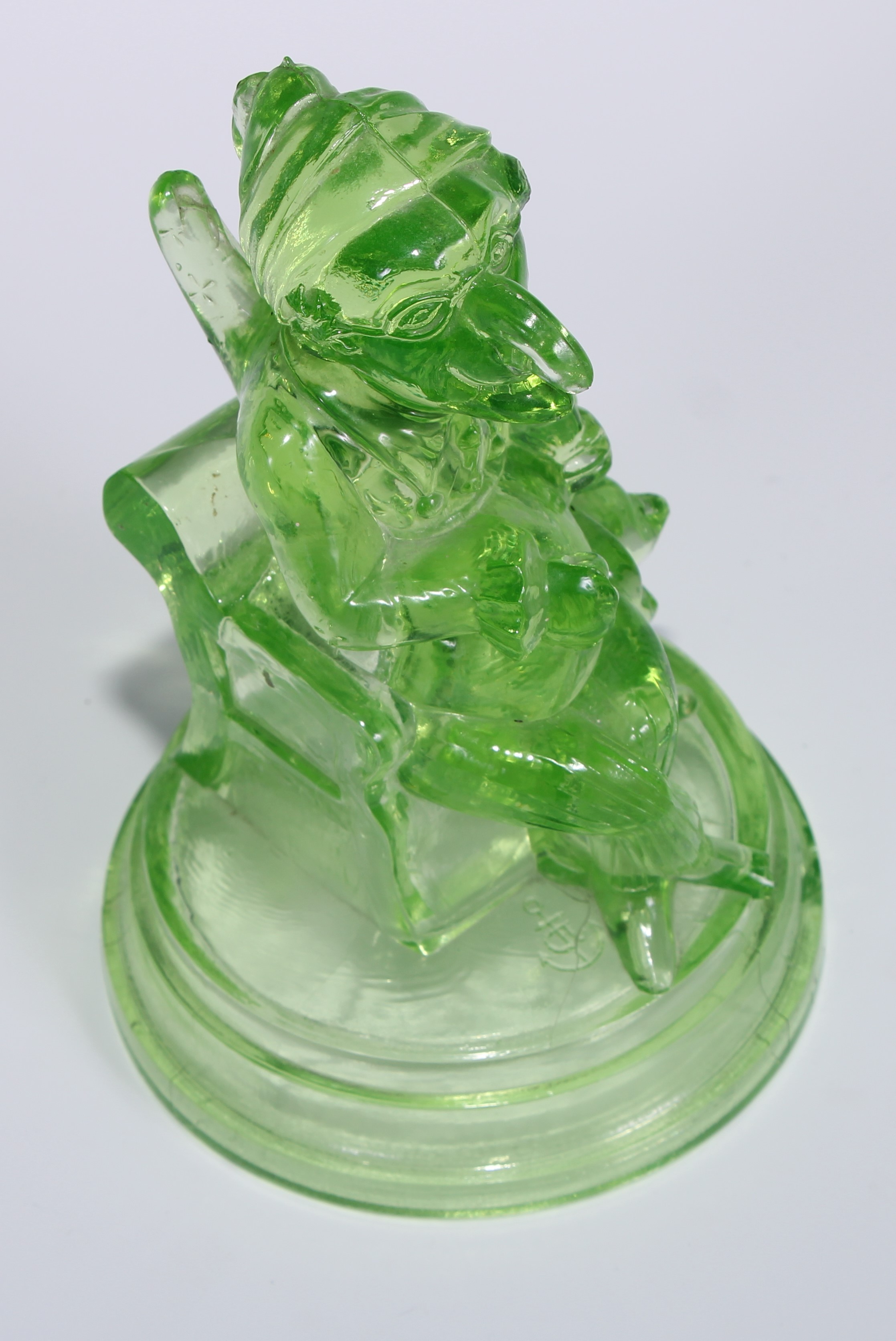 A pair of John Derbyshire press moulded uranium glass models, of Mr Punch and Judy, circular - Image 11 of 11