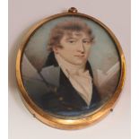 English School, early 19th century, a portrait miniature on ivory, of a gentleman, head and