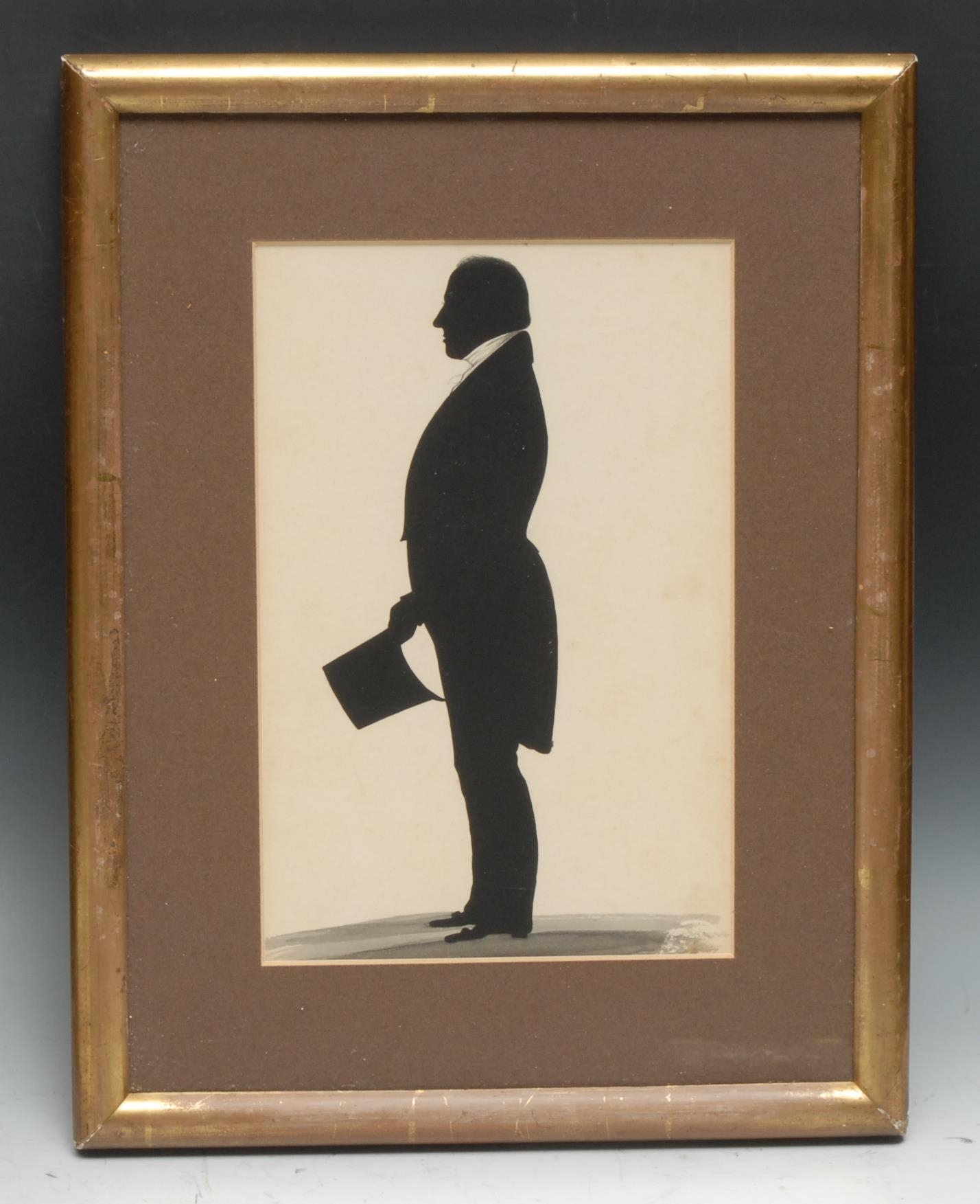 English School (19th century), a large silhouette, of a gentleman, he stands, in profile, top hat in