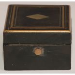 A 19th century French ebonised pocket watch box, hinged cover inlaid with a lozenge and outlined