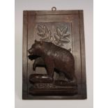 A Black Forest wall hanging correspondence rack, carved as a bear, 25.5cm long