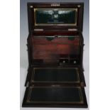 A 19th century rosewood and marquetry table-top writing cabinet, hinged cover and fall front