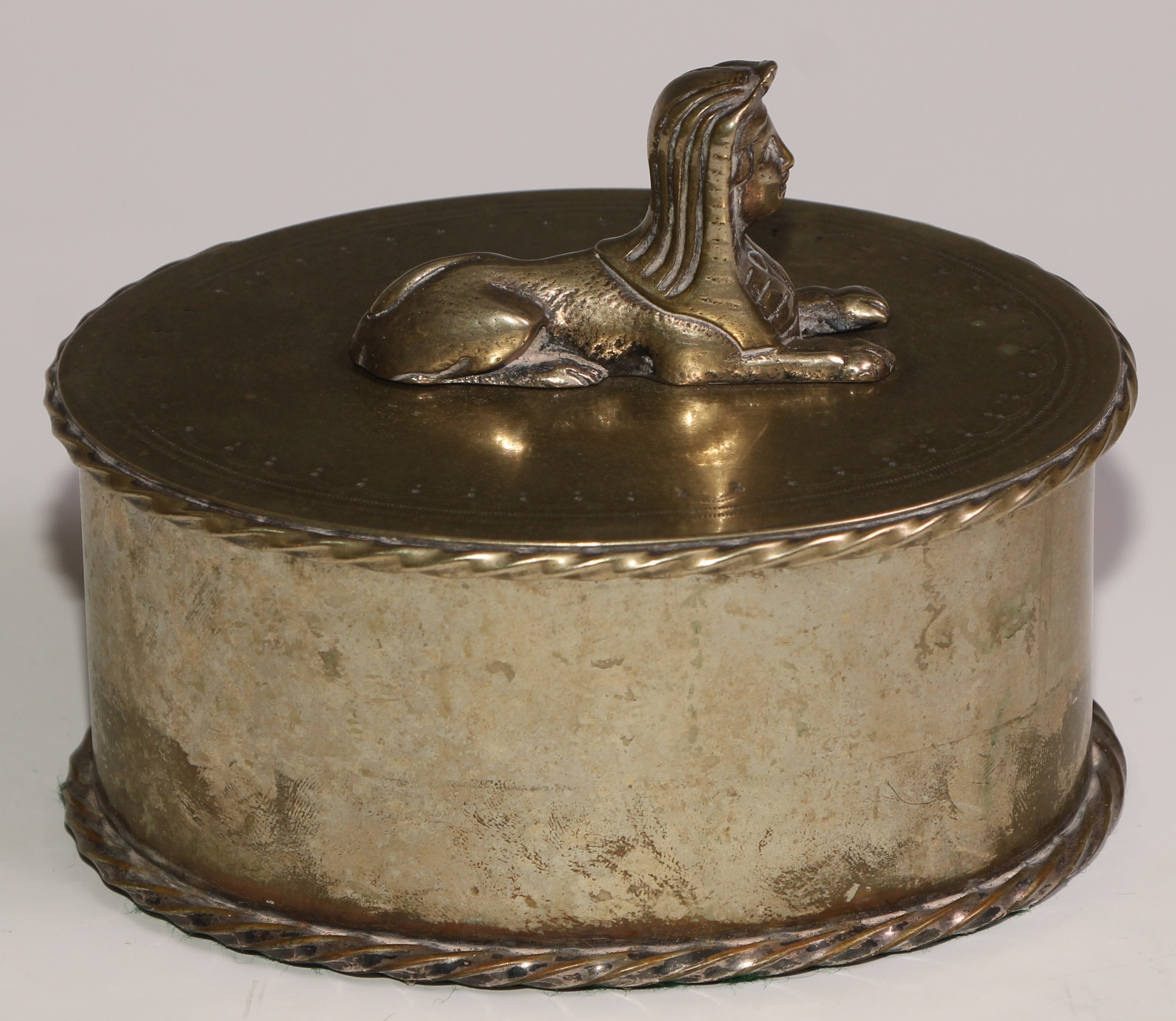 A Victorian Egyptian Revival silver plated oval box and cover, bright-cut engraved and surmounted by - Image 5 of 5