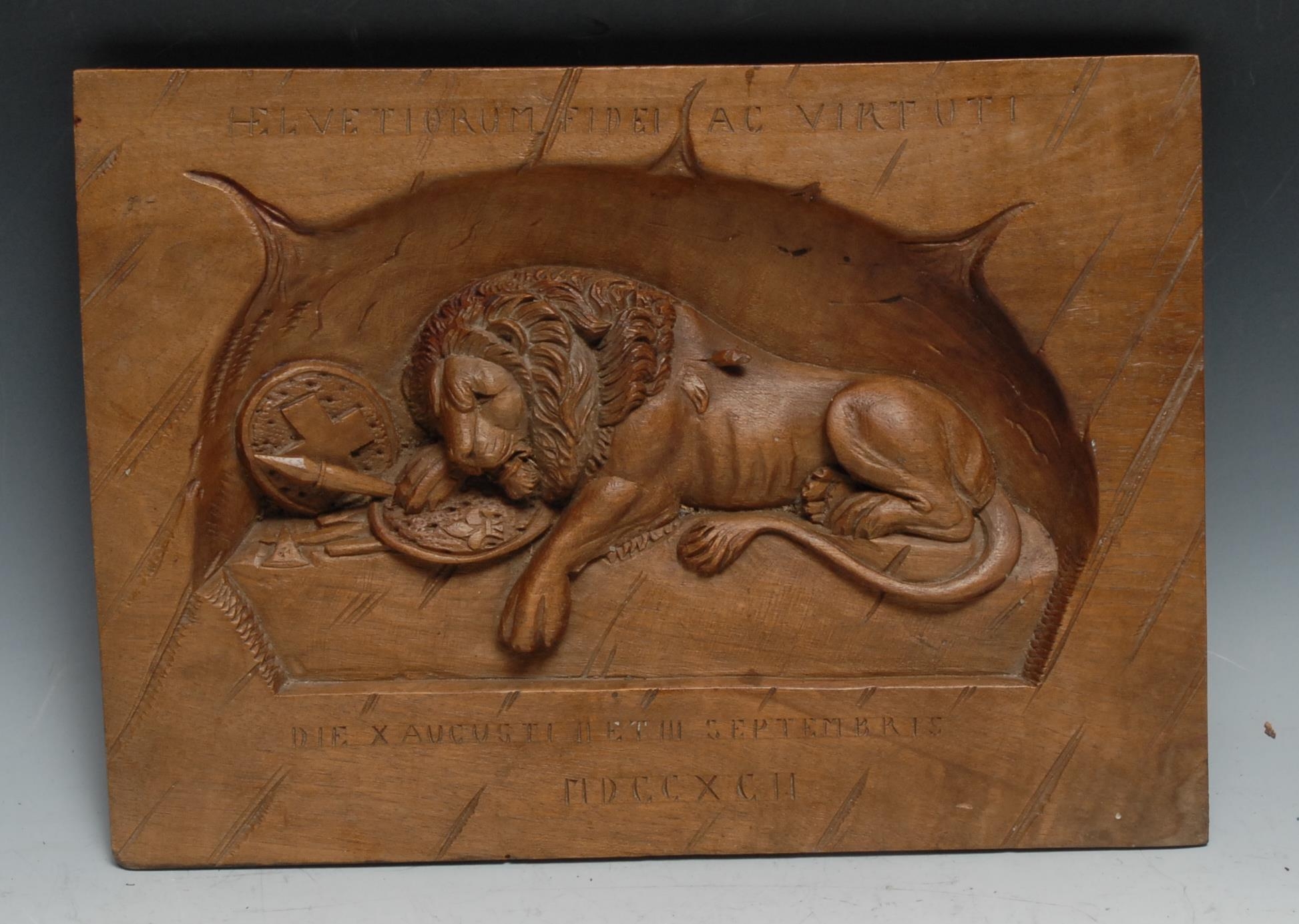 A 19th century Grand Tour panel, carved after Bertel Thorvaldsen with the Lion of Lucerne, 23cm x