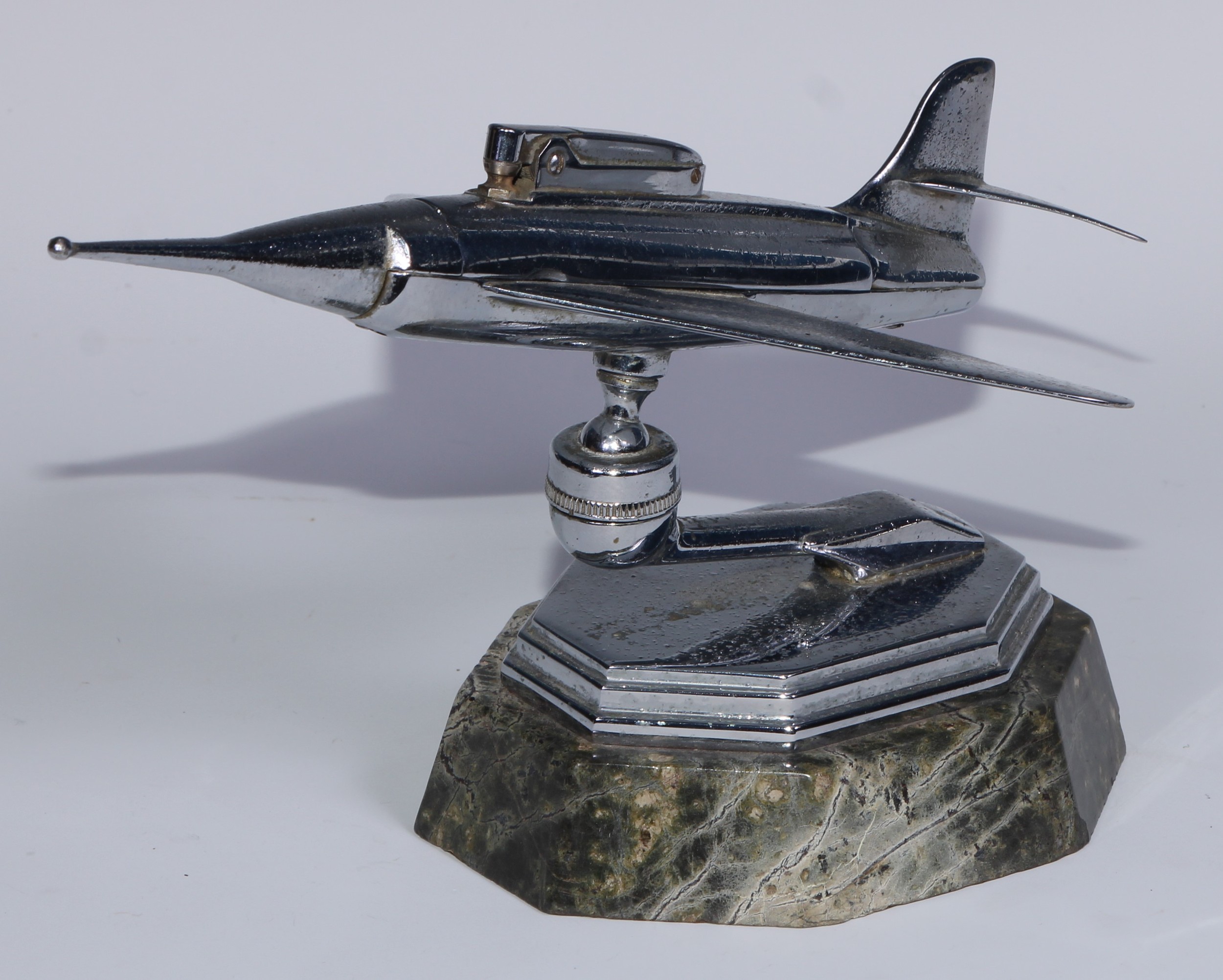 A mid-20th century chrome table lighter, as a fighter jet, marble base, 24cm long; an Art Deco style - Image 3 of 11