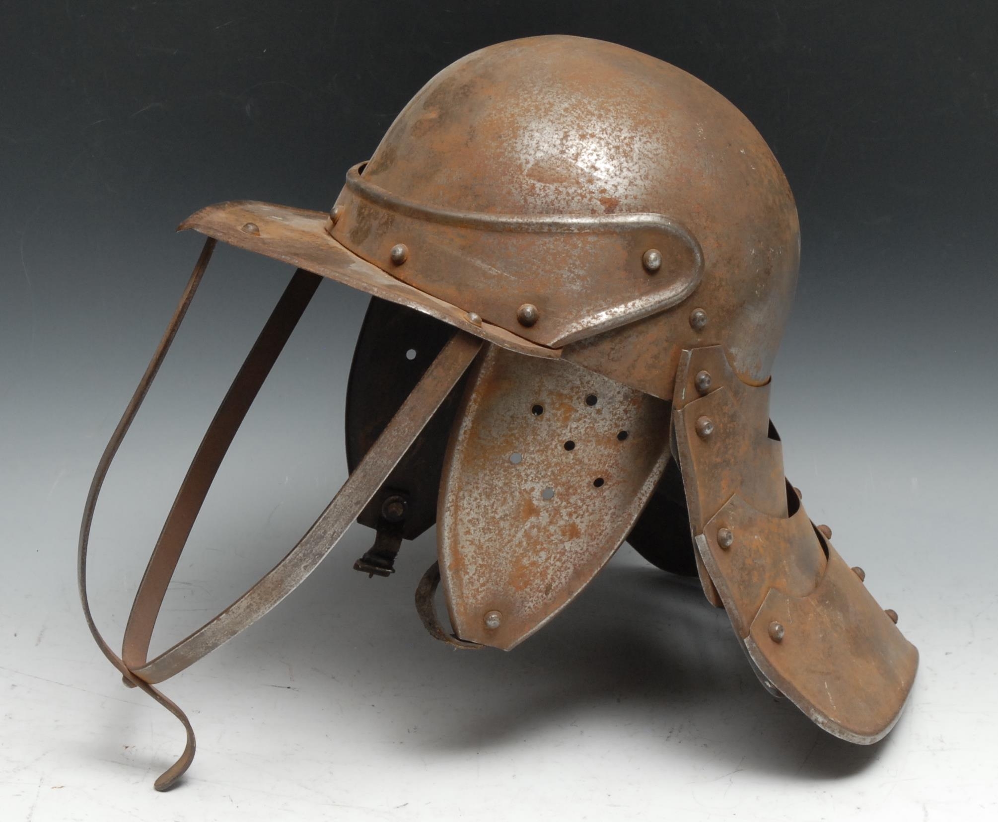 An English Civil War style Parliamentarian steel lobster tailed pot helmet, 33cm high