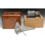 An early 20th century cylinder phonograph, walnut case; another