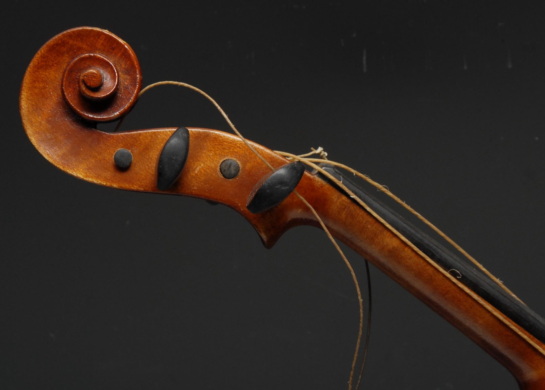 A violin, the one-piece back 33cm excluding button, Copie de Stradivarius label, ebony tuning - Image 3 of 3