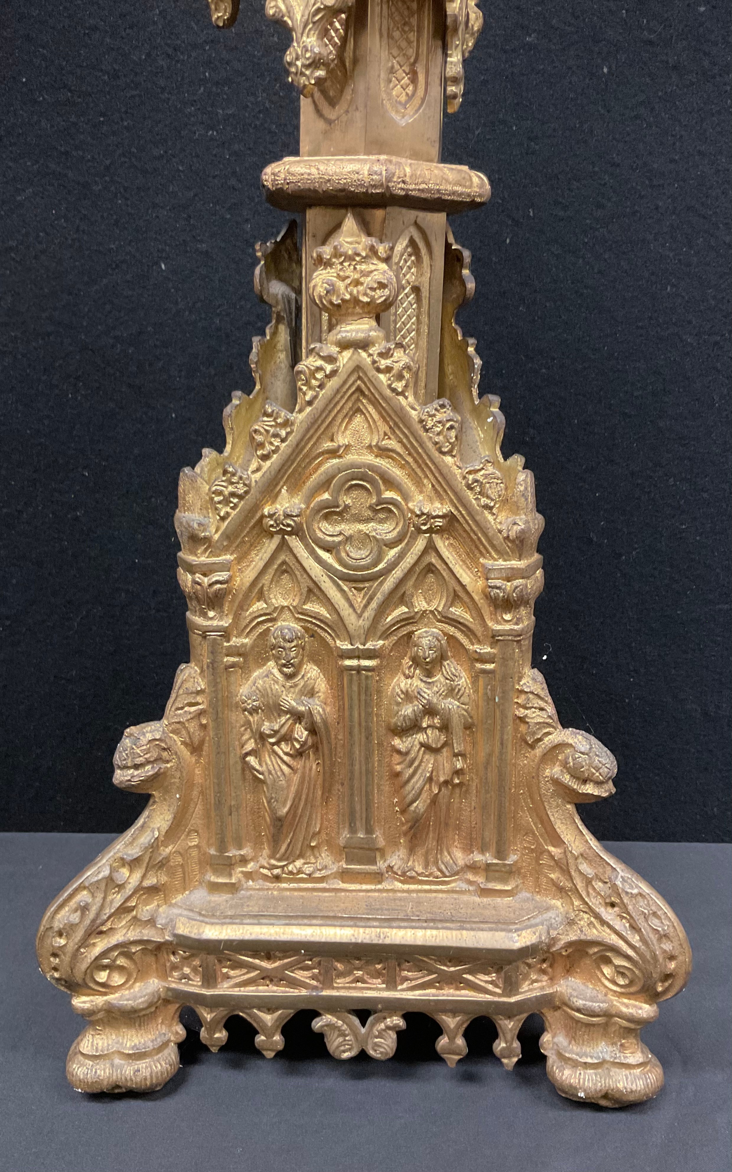 A set of four Gothic Revival gilt metal altar pricket candlesticks, cast throughout with figures and - Image 3 of 3