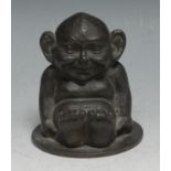 A 19th cabinet bronze, cast as a seated imp, circular base, 8.5cm high