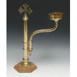 A Gothic Revival brass pulpit or lectern candlestick, the sconce and spiral branch adjustable on a