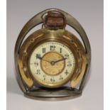 A late Victorian novelty timepiece, of equestrian interest as horseshoe within a riding stirrup, the