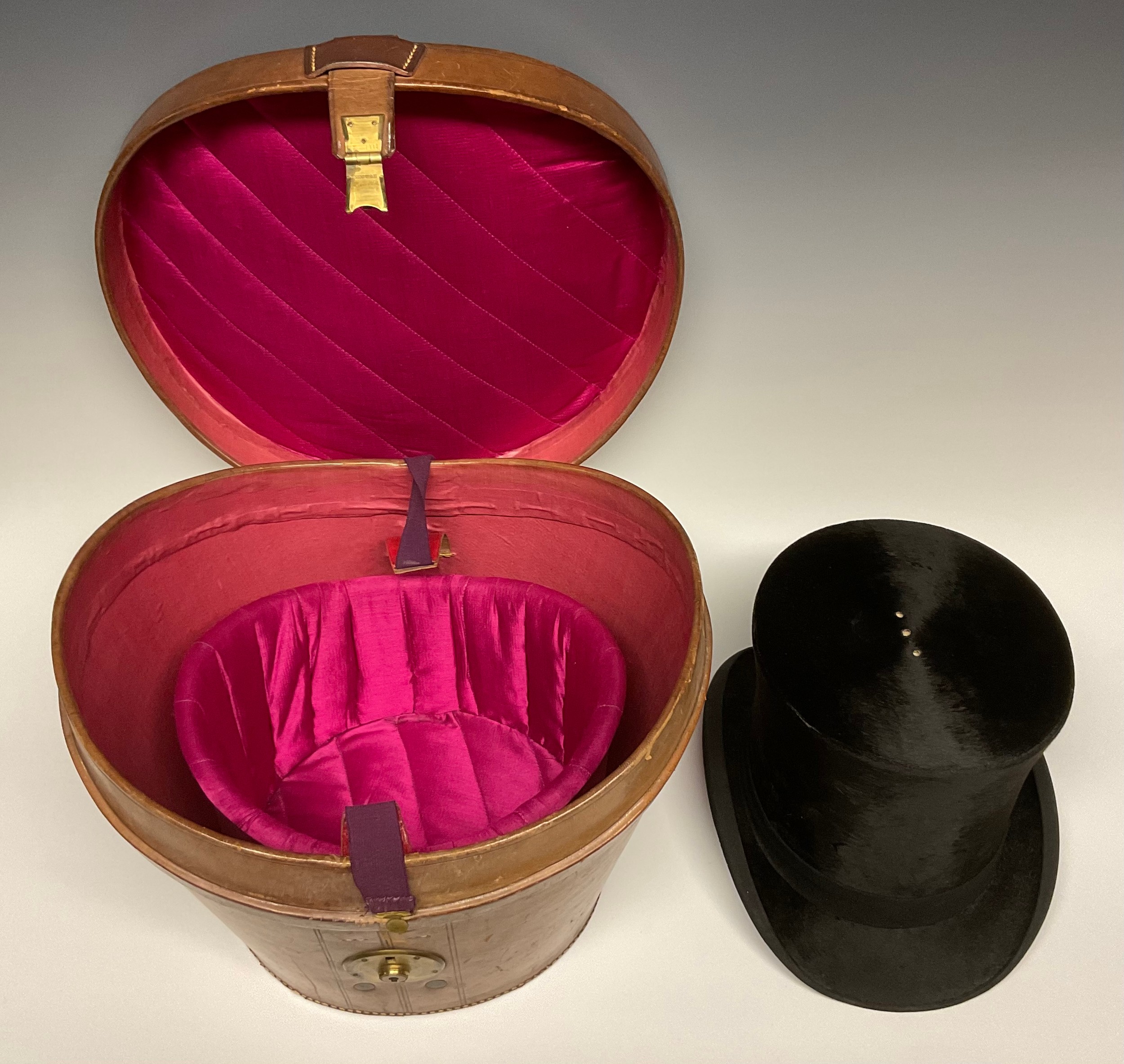 A 19th century leather top hat box, brass fittings, 35cm wide, c.1880; enclosing a silk top hat, - Image 2 of 4