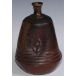 A 19th century salt glazed trefoil bottle vase, the dimpled sides applied with Chinese figure,