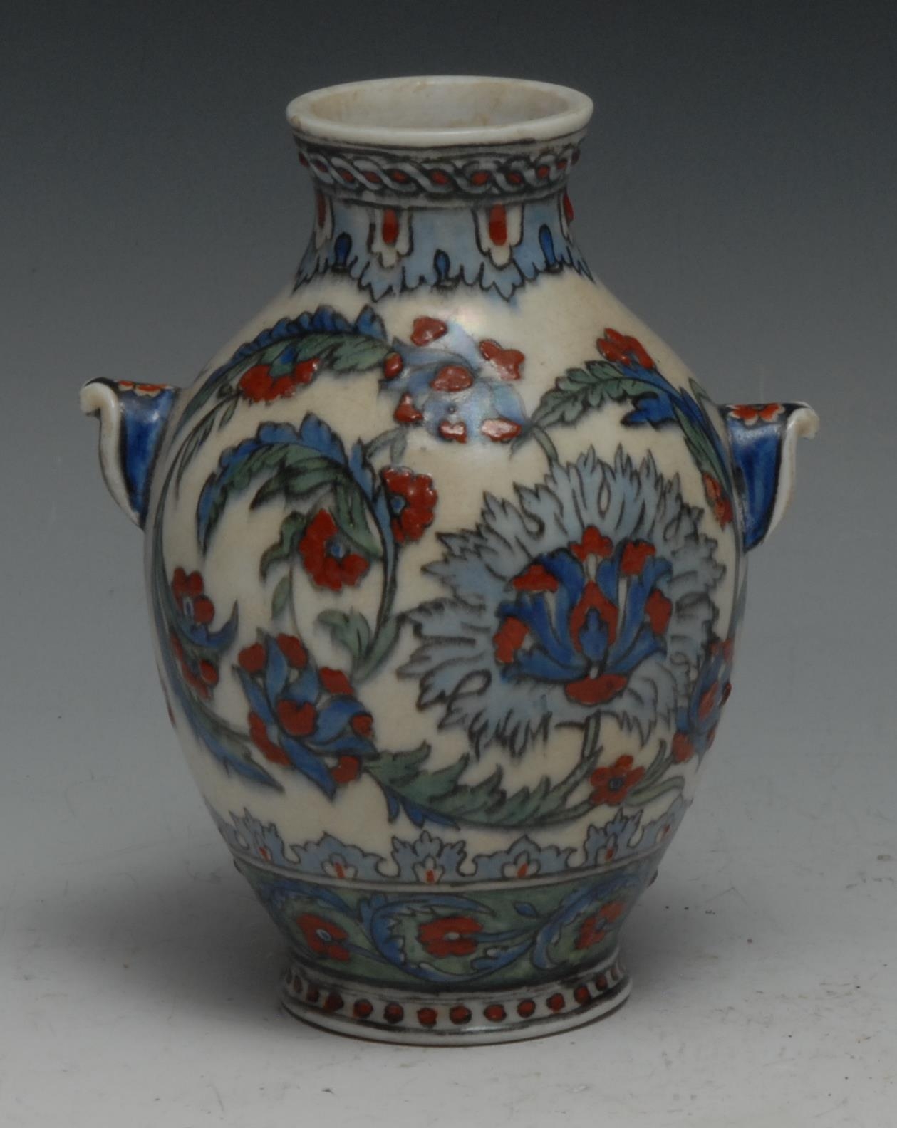 A Middle Eastern ovoid vase, painted in the Iznik palette of blue, green and sealing wax red with - Image 2 of 2