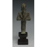 Antiquities - an Ancient Egyptian bronze figure, of Osiris, he stands, holding implements, 11cm