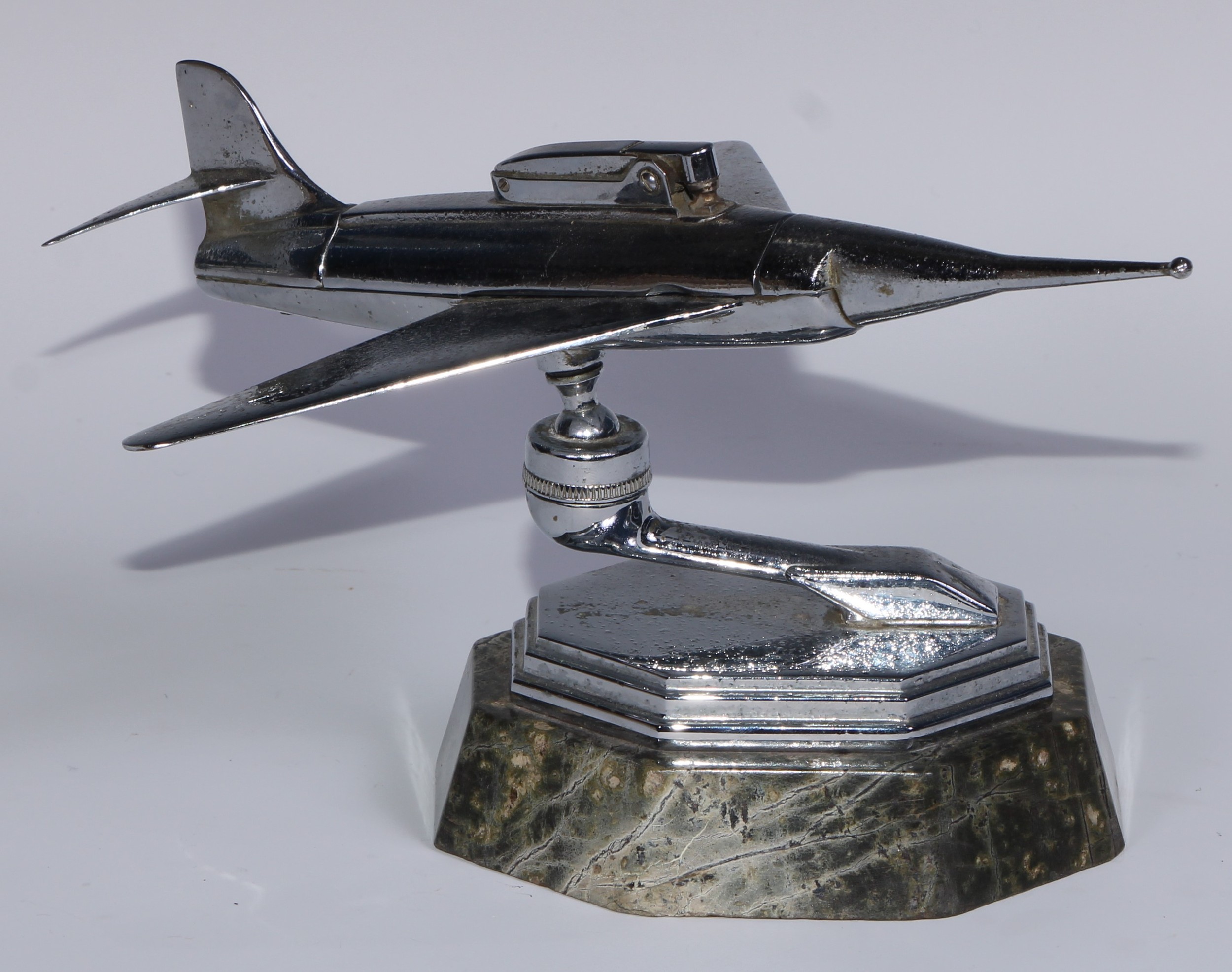 A mid-20th century chrome table lighter, as a fighter jet, marble base, 24cm long; an Art Deco style - Image 2 of 11