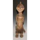 Decorative Tribal Art and the Eclectic Interior - an African ancestor fetish figure, diamond