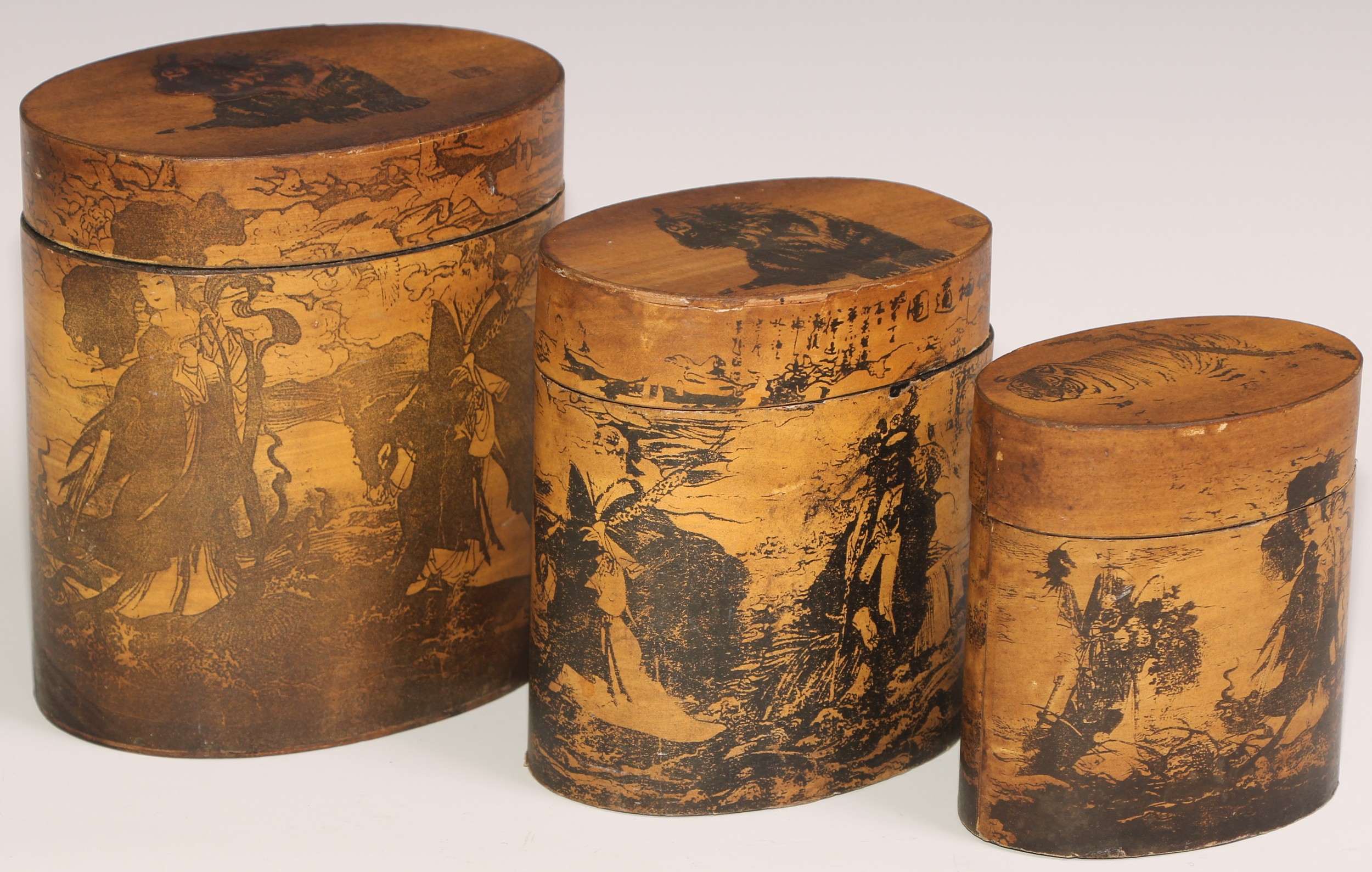 A stacking nest of Japanese oval boxes, decorated with bears and narratuve scenes, the largest 13. - Image 2 of 18