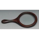A 19th century mahogany connoisseur’s lens, the magnifying glass 12cm diam, 21cm long overall