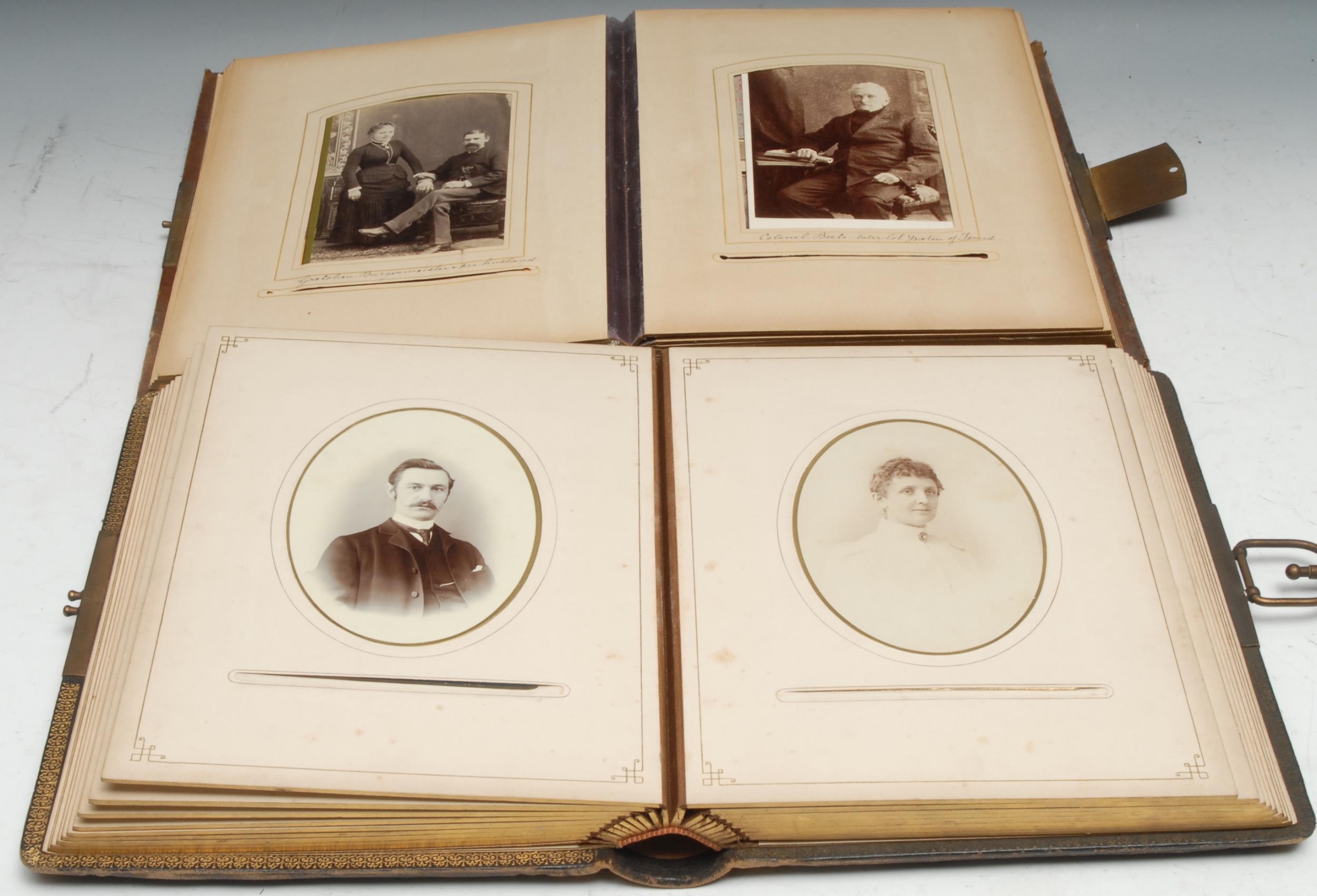 Photography - a late 19th century tooled leather carte de visite album, containing mostly single - Image 3 of 5