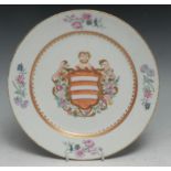 A 19th century French armorial porcelain plate, in the Chinese taste, decorated in the famille