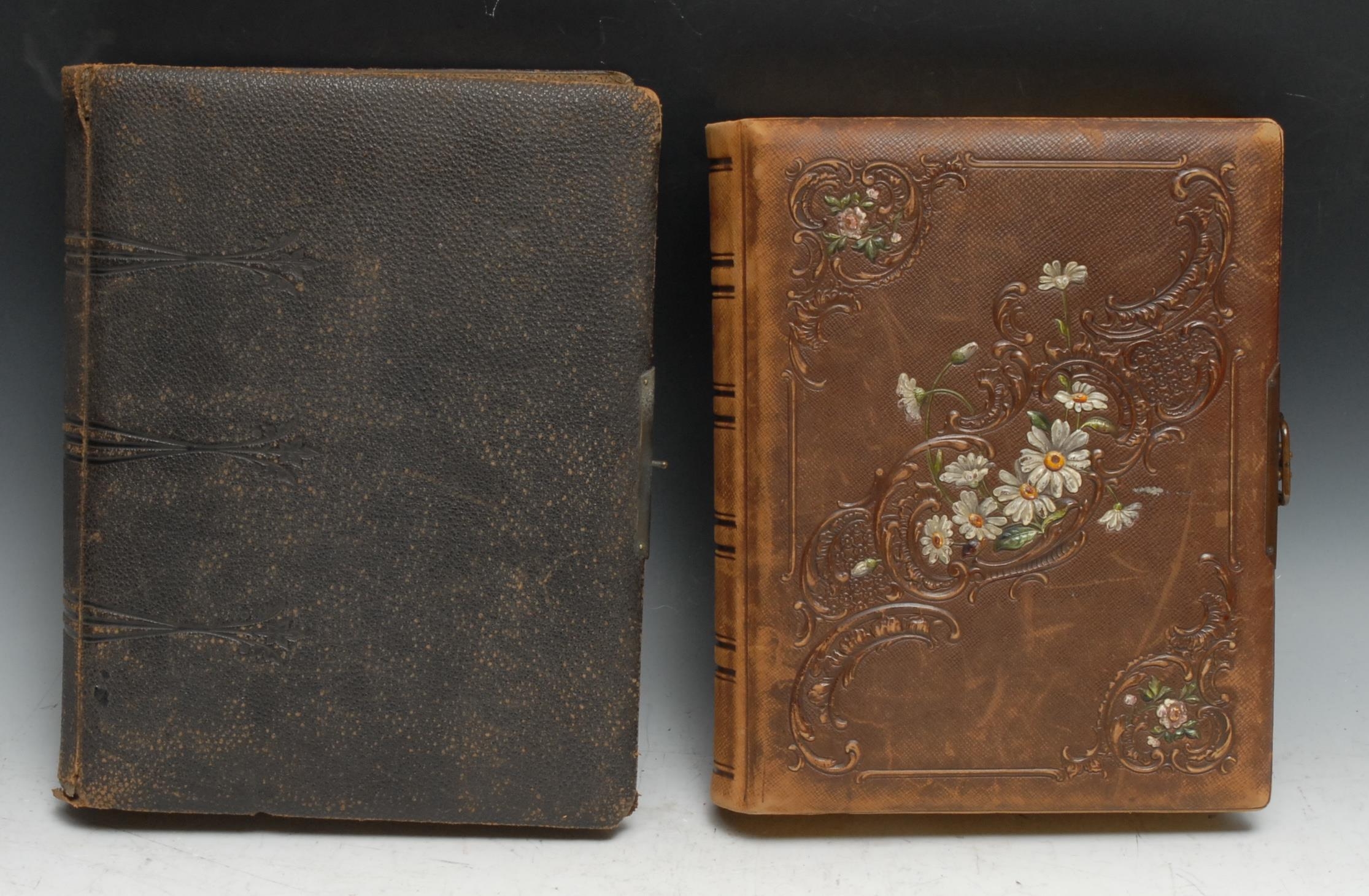 Photography - a 19th century tooled leather carte de visite album, containing various single and