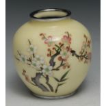 A Japanese cloisonne vase, decorated in polychrome with blossoming prunus on a pale yellow ground,