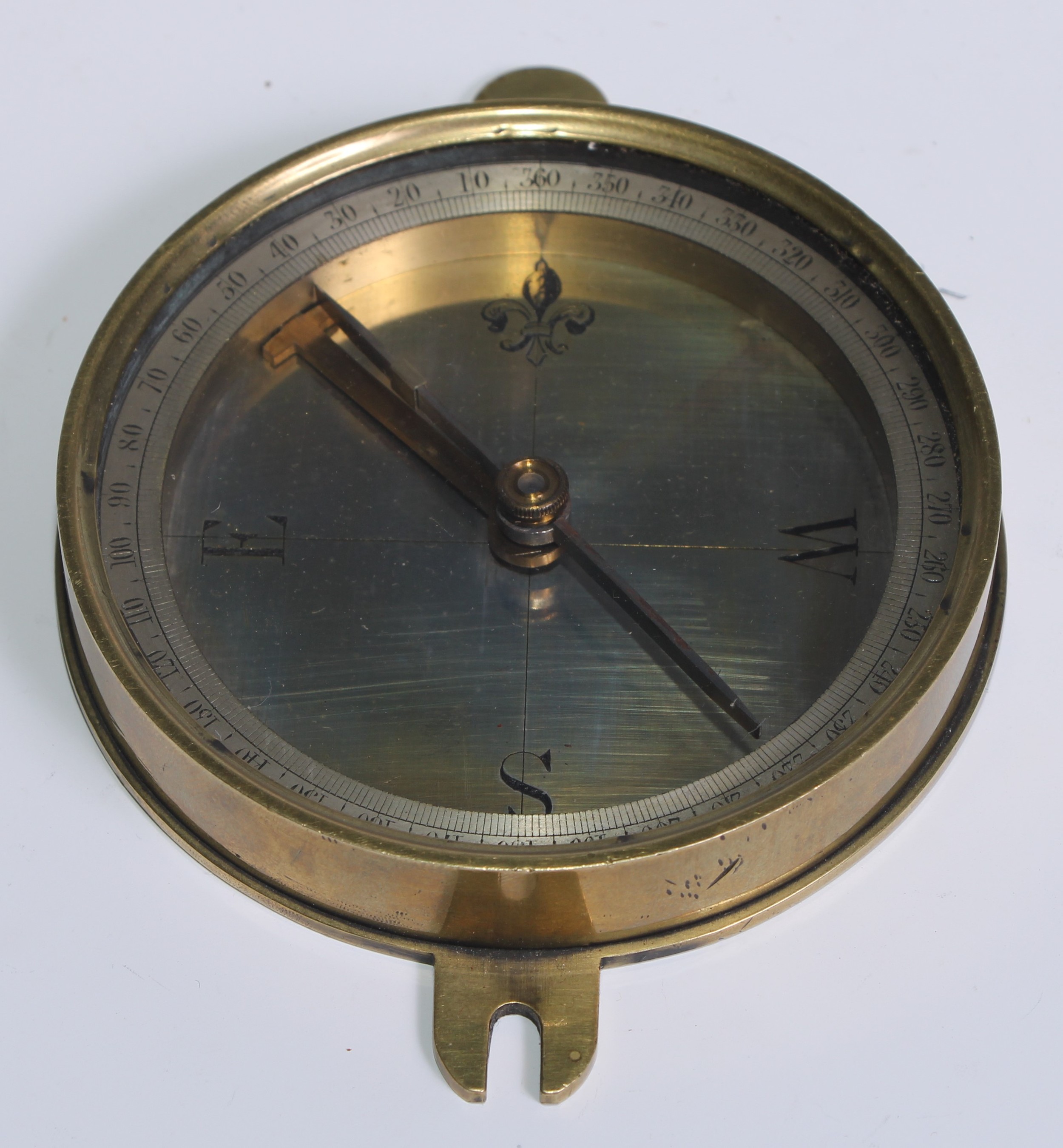 A 19th century brass compass, 8.5cm silvered dial engraved with fleur-de-lys, lockable needle, - Image 2 of 4